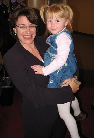 Eleanor Olsen and Amy Klobuchar at a Klobuchar fund raiser. Photo by Jon Olsen.